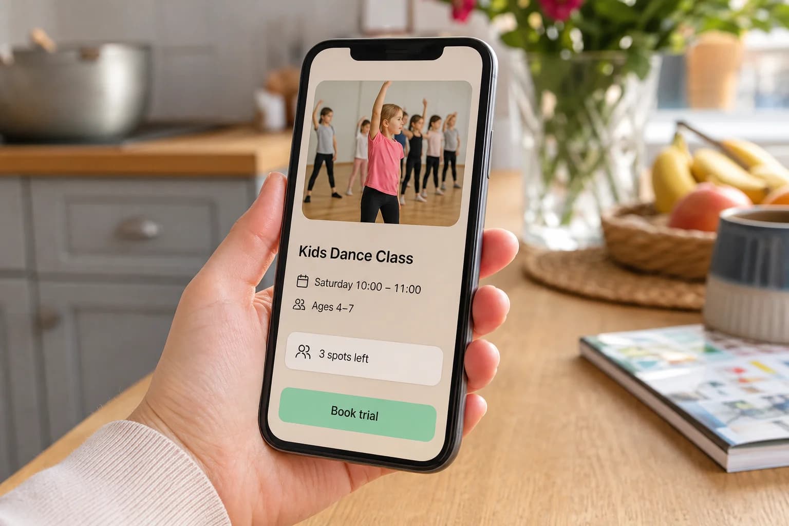 Illustration of a parent booking a trial on a phone